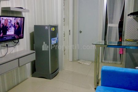 Sewa Apartemen Bassura City 2 BR 34 m2 Full Furnished Tower Cattleya Lantai 23 View Pool & City - Tanpa Perantara