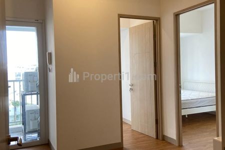 Jual Apartemen Tokyo Riverside PIK 2 - 2BR Semi Furnish Lantai Vinyl - View Kolam